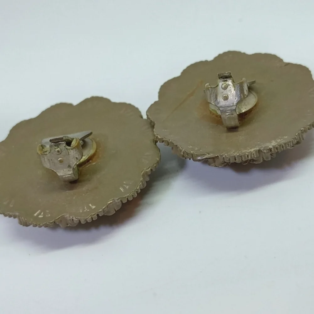 * vintage brown celluloid & moonglow clip on earrings